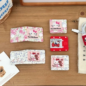 Cute Japanese style Hello Kitty fabric cable organizer with polka dots and floral patterns