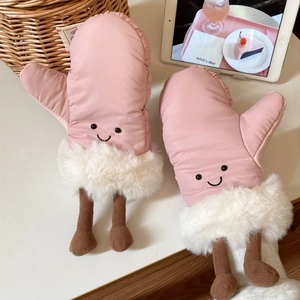 Detail of pink cartoon skiing mittens with fluffy faux fur and cute embroidery