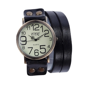 Vintage quartz watch with black triple-wrap leather strap and bronze rivets on white background