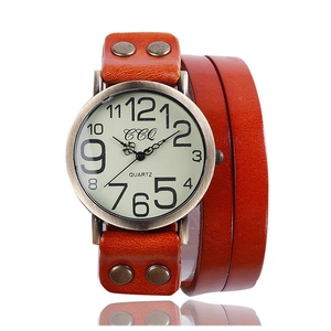 Vintage CCQ quartz watch with triple-wrap reddish brown leather strap and bronze metal case