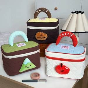 Quilted cosmetic bags with plush charms and Jolly embroidery in colorful designs