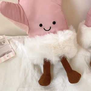 Detail of pink plush ski gloves with fluffy white faux fur and cute dangling legs