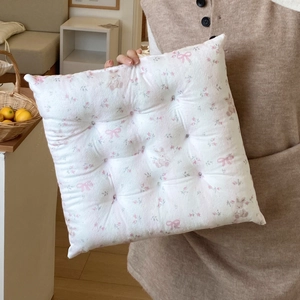 Detail of floral chair cushion with nine-point quilting and cute bunny pattern