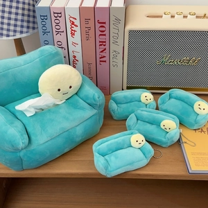 Detail of plush mint green sofa tissue box with mini matching sofa keychains