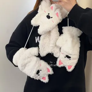 Détail de l'ensemble d'hiver Westie en peluche blanche avec écharpe et moufles