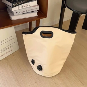 Detailed view of portable foot bath bucket with drainage valve and reinforced handle