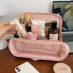 Large capacity pink travel toiletry bag with internal compartments for makeup storage