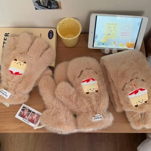 Detail of plush camel winter gloves and scarf featuring cute cupcake embroidery accents