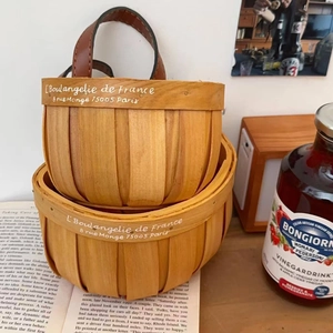 Set of two Nordic woven wood storage baskets with leather handles in French rustic style