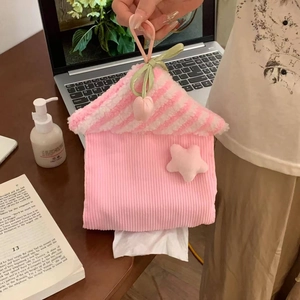 Pink and white house-shaped tissue holder with star accents and hanging rope