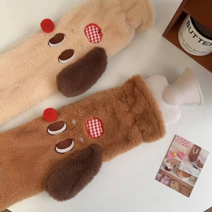 Detail of plush dachshund dog hot water bottle covers in brown and camel faux fur