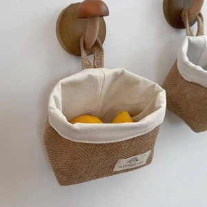Hanging jute storage basket with canvas lining for kitchen garlic and ginger storage