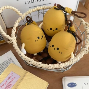 Three cute potato-shaped silicone charms in a basket with clips for bags and keychains