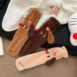 Macro detail of long dachshund plush hot water bottle covers with lucky embroidery