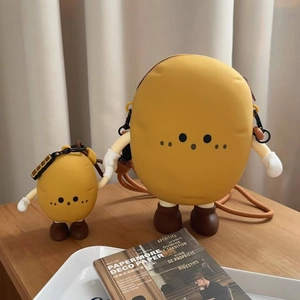 Detailed view of creative potato-shaped silicone crossbody bag and matching mini coin purse