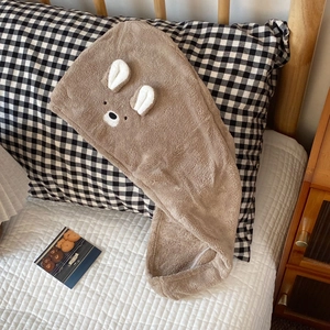 Detail of soft brown coral fleece hair towel featuring cute 3D ears and bear embroidery