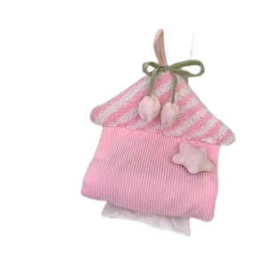 Pink house-shaped tissue box holder made of plush corduroy with a convenient hanging handle