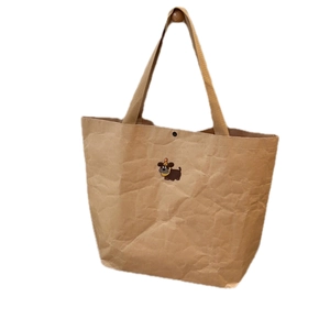 Brown kraft paper tote bag with cute cartoon puppy embroidery and durable handles