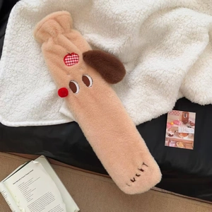 Detail of dachshund plush cover for long hot water bottle with soft faux fur and LUCKY embroidery