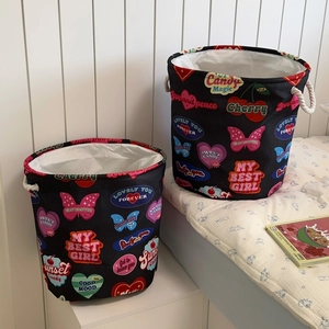 Detail of vintage heart laundry baskets set with cotton rope handles and waterproof lining