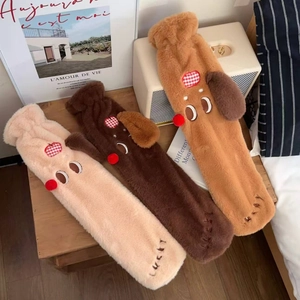 Three plush cartoon dachshund hot water bottle covers in beige, brown and tan colors