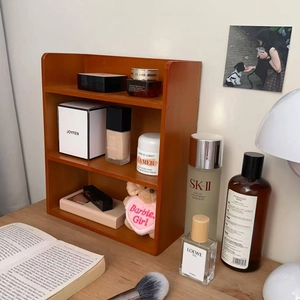 Three-tier solid wood desktop organizer shelf in reddish-brown finish for cosmetics