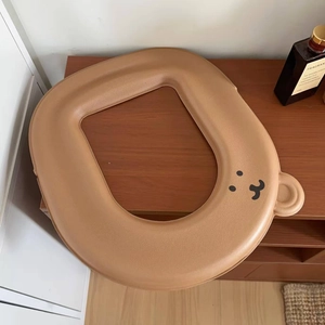 Detail of waterproof D-shaped brown bear toilet seat cover with cute ear design