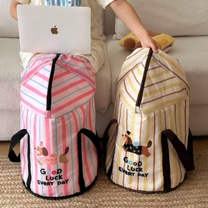 Detail of portable striped foot bath buckets with zippers and handles for easy storage