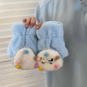 Close-up of plush blue gloves featuring colorful pom-poms and cute dog embroidery detail