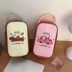 Detail of cute cartoon dog and cat insulated lunch bags with checkerboard side panels