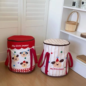 Close-up of portable foldable foot soak buckets with cute puppy illustrations and red lids
