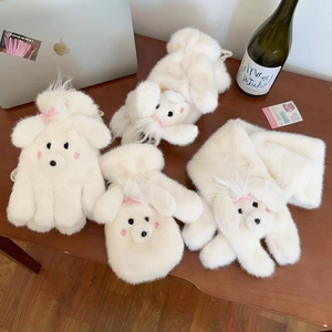 Detail of plush white puppy gloves and scarf set with cute pink checkered bows