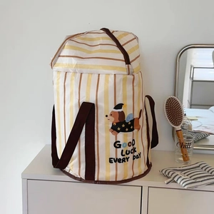 Detail of yellow striped foldable foot bath tub with cartoon dog and zipper lid