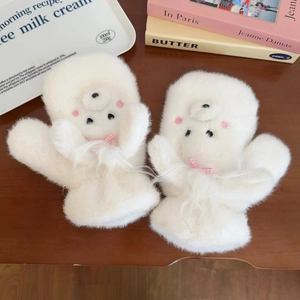 Detail of white plush mittens featuring cute bear embroidery and pink plaid bow accents