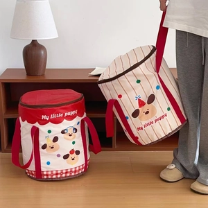 Close-up of portable foldable foot bath bag with cute puppy pattern and red handles