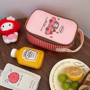 Detail of pink cartoon lunch bag with red checkered side and thick insulated handle