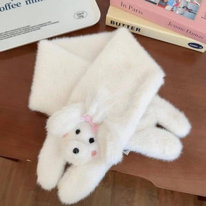 Detailed close-up of a white plush scarf featuring a cute puppy character with a pink bow