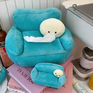 Cute green plush sofa tissue box and mini coin purse set on decorative pink books