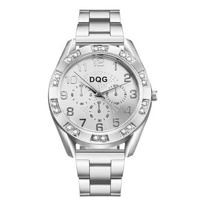 Detailed close-up of DQG silver quartz watch with rhinestone bezel and sunray dial