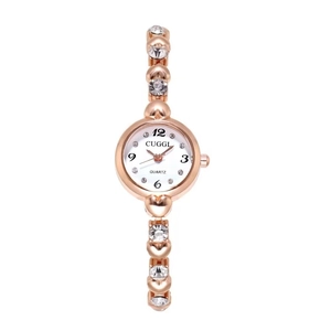 Detail of rose gold women watch band with heart links and sparkling crystal stones