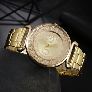 Orologio al quarzo dorato da donna con cristalli e cinturino in acciaio inossidabile