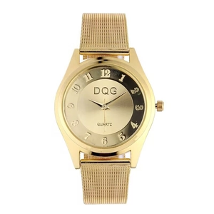 Close-up of golden quartz watch dial with Arabic numerals and mesh metal strap