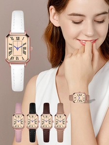 Close-up of rectangular vintage quartz watches with leather straps in five assorted colors