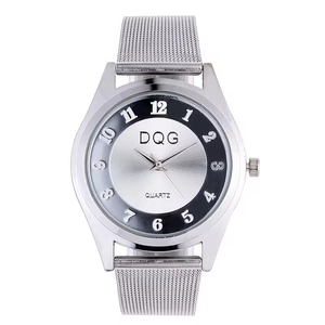 Detail of silver quartz watch featuring Milanese mesh strap and numeric dial display