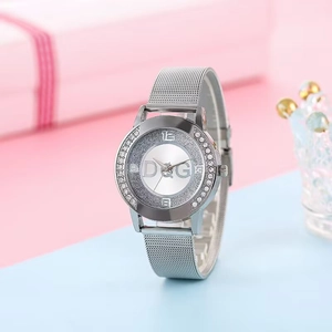 Detail of silver mesh watch band with diamond-encrusted bezel and D&G dial logo