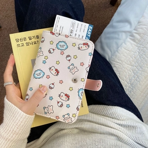 Pink cartoon passport holder with metallic snap closure and internal storage slots