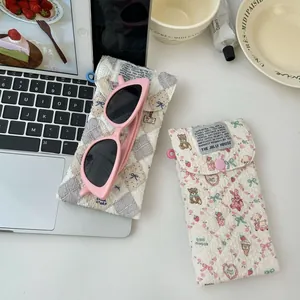 Quilted cotton padded sunglass cases with floral bear and beige check patterns