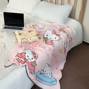 Detail of pink flannel blanket featuring cartoon cat pattern and grey piped edging