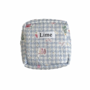 Quilted lime storage bag with blue gingham and cute vintage style illustrations