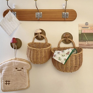 Creative wooden mushroom wall hooks with woven baskets in a natural home setting